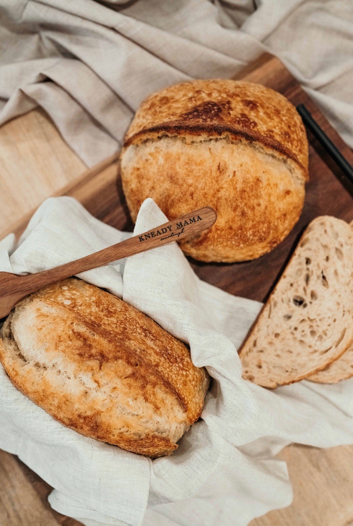 3 pieces of sourdough bread with a wooden utensil